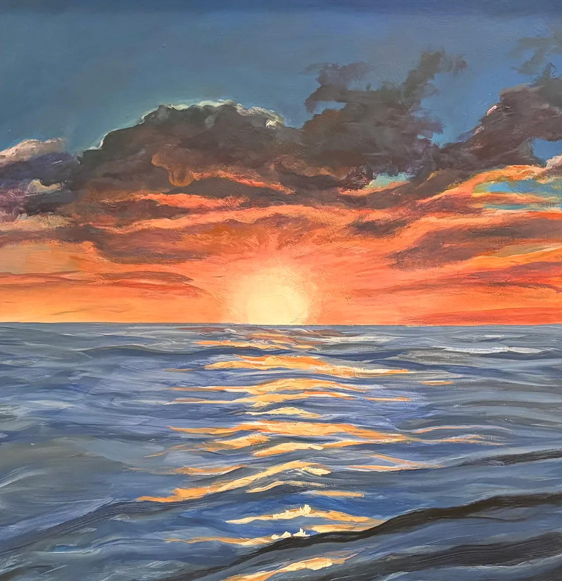 Dianne Thompson painting in her studio